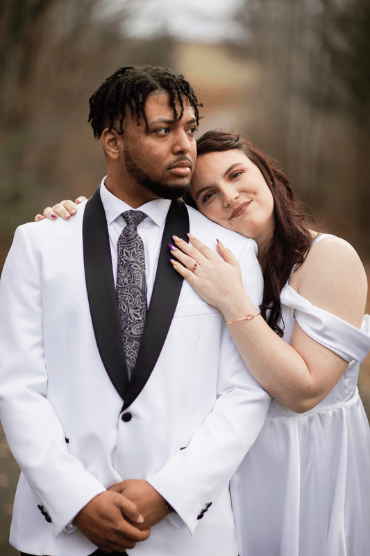 Bride resting her head on the groom's shoulder